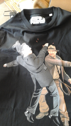 Indiana Jones punching Elon Musk.